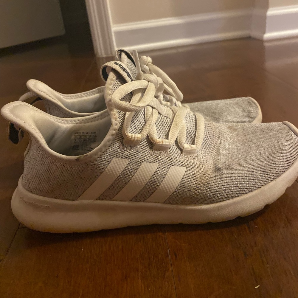 White and grey adias althetic shoes